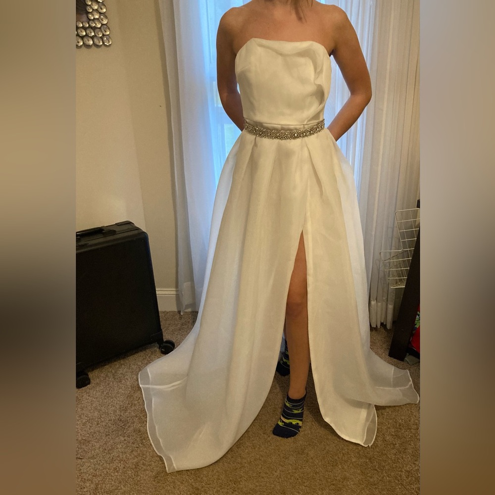 NWT White strapless pageant dress or wedding ball gown with slit . Size small